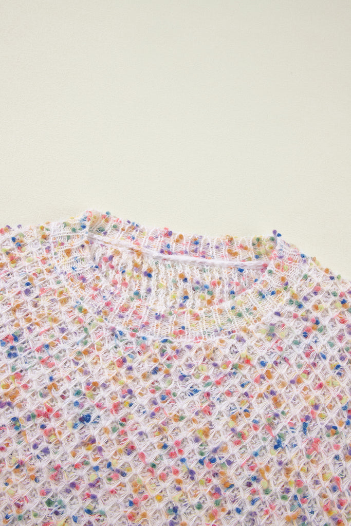 Add a playful pop of color with the eye-catching confetti pattern! A trendy, stylish look is achieved with the unique popcorn texture. The soft and cozy knit construction ensures ultimate comfort. This versatile sweater top is perfect for any occasion.