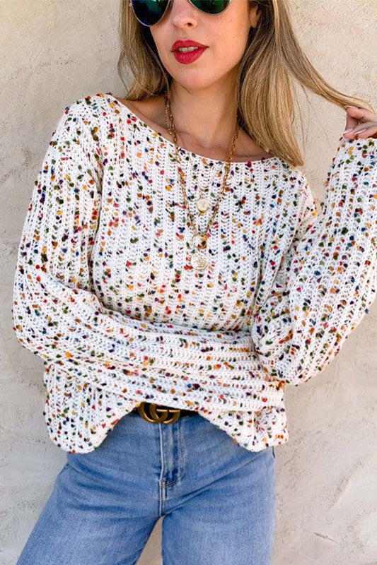 This confetti sweater is stylish and eye-catching.
Versatile reversible design for two distinctive looks.
Stylish twist detail adds a touch of uniqueness.
Perfect for layering or wearing on its own.