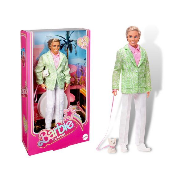 A Barbie The Movie collectible doll in a pastel suit with a white dog on a pink leash, packaged in a pink and white box.