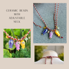 Beach inspired necklace with colorful ceramic fish beads on rope adjustable necklace