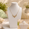 Ocean themed necklace front and back with beads and 18K gold plated charms. 