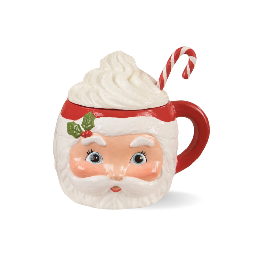 Bethany Lowe's Sweet Tidings Santa Head Mug Container  This fabulous perfectly retro Santa container is a wonderful addition to your Christmas decor. Painted in traditional red and green with a holly accents and a sculpted whip cream filled lid with candy cane sprinkles on top, this table piece is sure to be a treasure brought out every year. Cute Christmas Santa Head