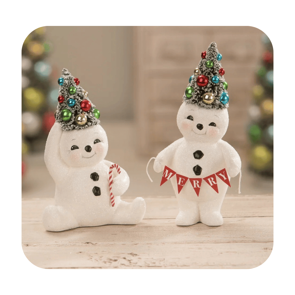 Bethany Lowe Snowman | Bring home the best of retro inspired decor with this adorably, chubby, snowman with colorful bottle brush tree on head and candy cane in hand.Bethany Lowe Retro Snowman with Candy Cane Bottle Brush Tree | Bethany Lowe Retro Snowman | Bethany Lowe Cute Snowman