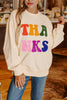 The THANKS chenille embroidered The THANKS chenille embroidered graphic sweatshirt. 
This relaxed fit style, classic crew neck, drop shoulder design. 
The oversized style makes wearers feel slender and fashionable.
Style: Cute Fall Sweatshirt, Thanksgiving sweater