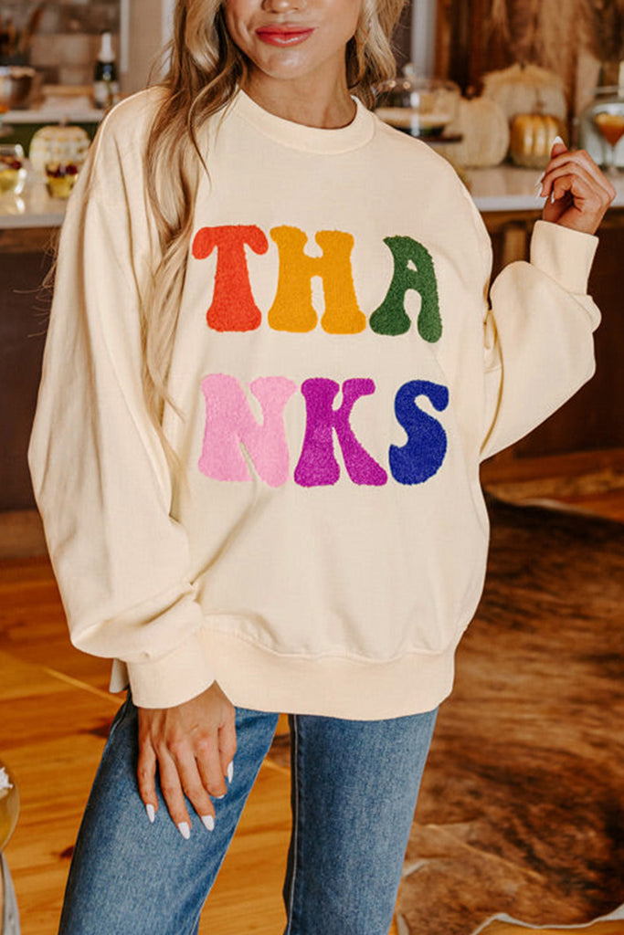 The THANKS chenille embroidered The THANKS chenille embroidered graphic sweatshirt. 
This relaxed fit style, classic crew neck, drop shoulder design. 
The oversized style makes wearers feel slender and fashionable.
Style: Cute Fall Sweatshirt, Thanksgiving sweater