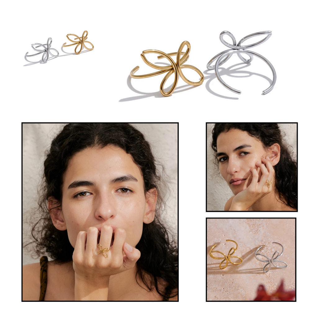 Modern butterfly shaped or floral petal silhouette ring on model's hand that is dainty adjustable and stainless steel