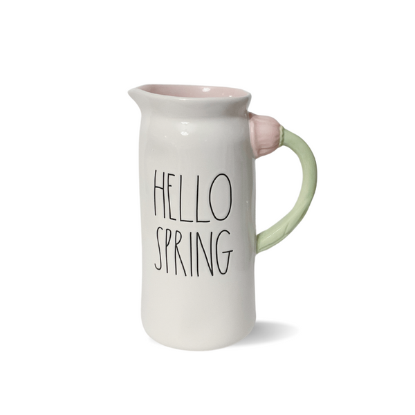 <p data-mce-fragment="1"><span style="font-size: 0.875rem;">Rae Dunn artisan collection Hello Spring pitcher features a beautiful flower handle, making it perfect for serving drinks or displaying fresh blooms. Its farmhouse style will add a touch of charm to any space. You'll be captivated by this piece, just as we are!</span><br></p> <p data-mce-fragment="1">Stoneware | 9"H x 4.5"Diameter</p> <p data-mce-fragment="1">&nbsp;</p>