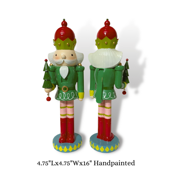 Bring some festive cheer with this adorable 16.5" Resin Nutcracker With Tree! Crafted in quirky greens, red, and pink, it's the perfect playful addition to your holiday home decor. Add it to your tabletop or mantle for a touch of whimsy. Perfect for decorative use and easily cleaned with a damp cloth. Measures 16.5" Tall (4.75" L&amp;W), you won't be able to resist this cute little guy!