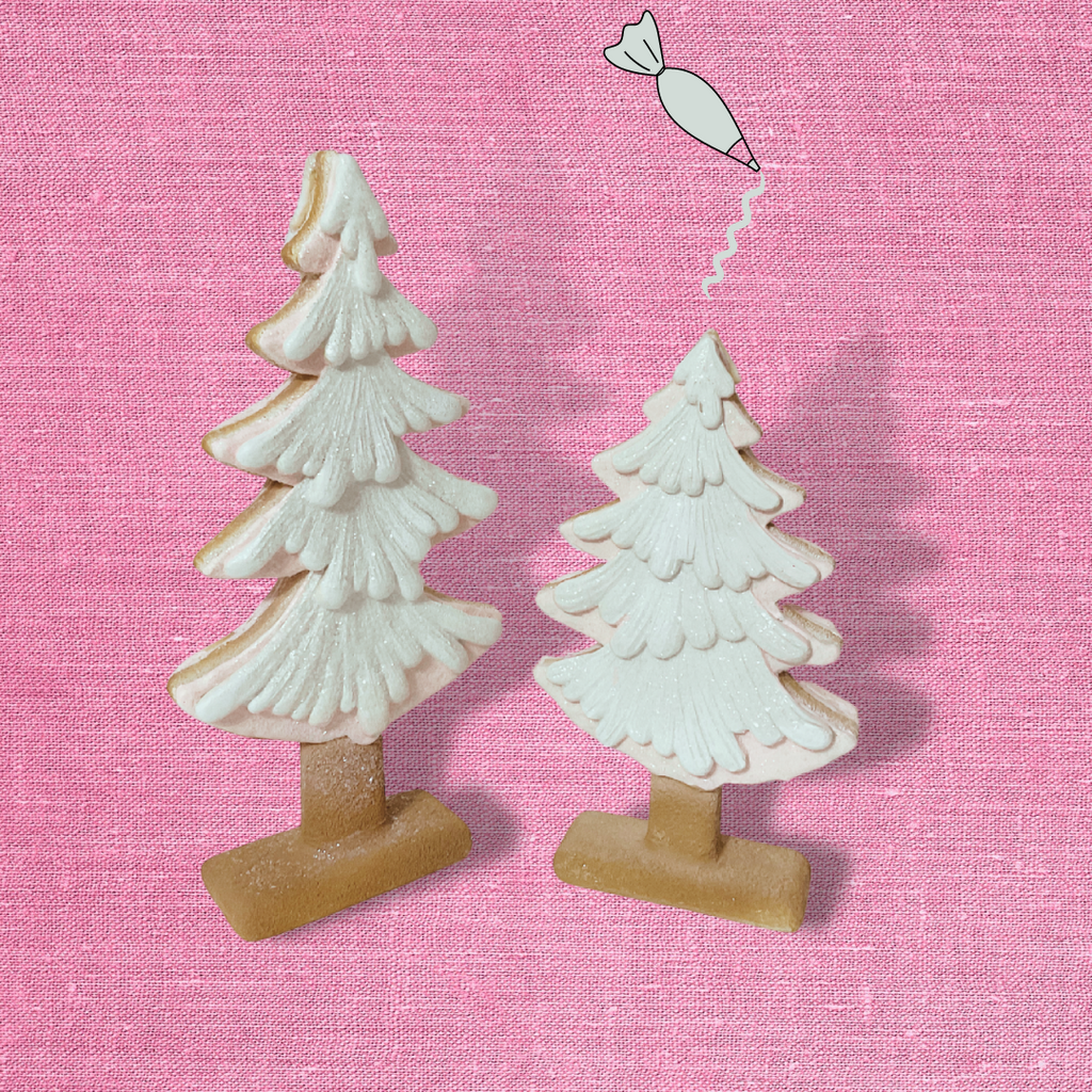 Add a lovely touch to your bakery sweets holiday decor with these Gingerbread trees, iced in pink and white for a delightful and charming look. &nbsp;We appreciate these trees for the solid design and well just the cuteness of them! 