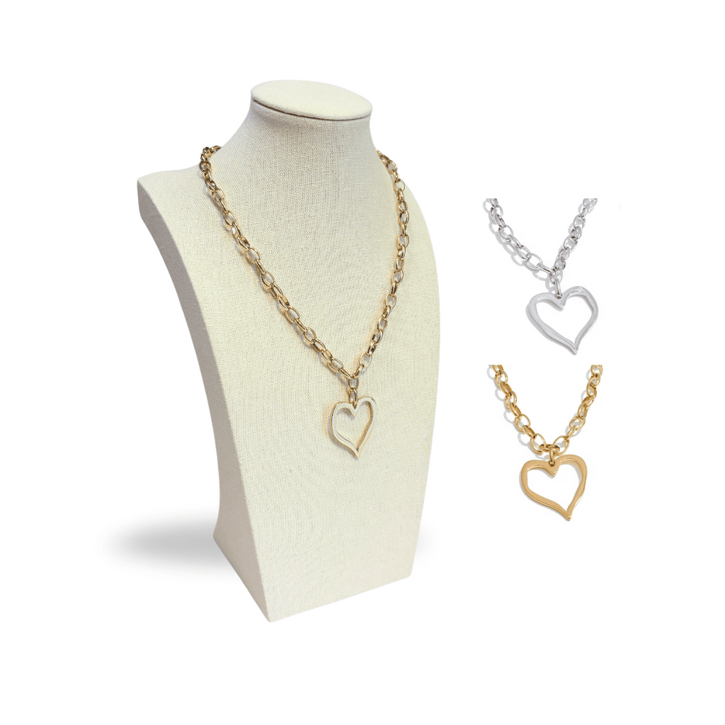 Gold heart drop pendant necklace on stand showing silver or gold color options.