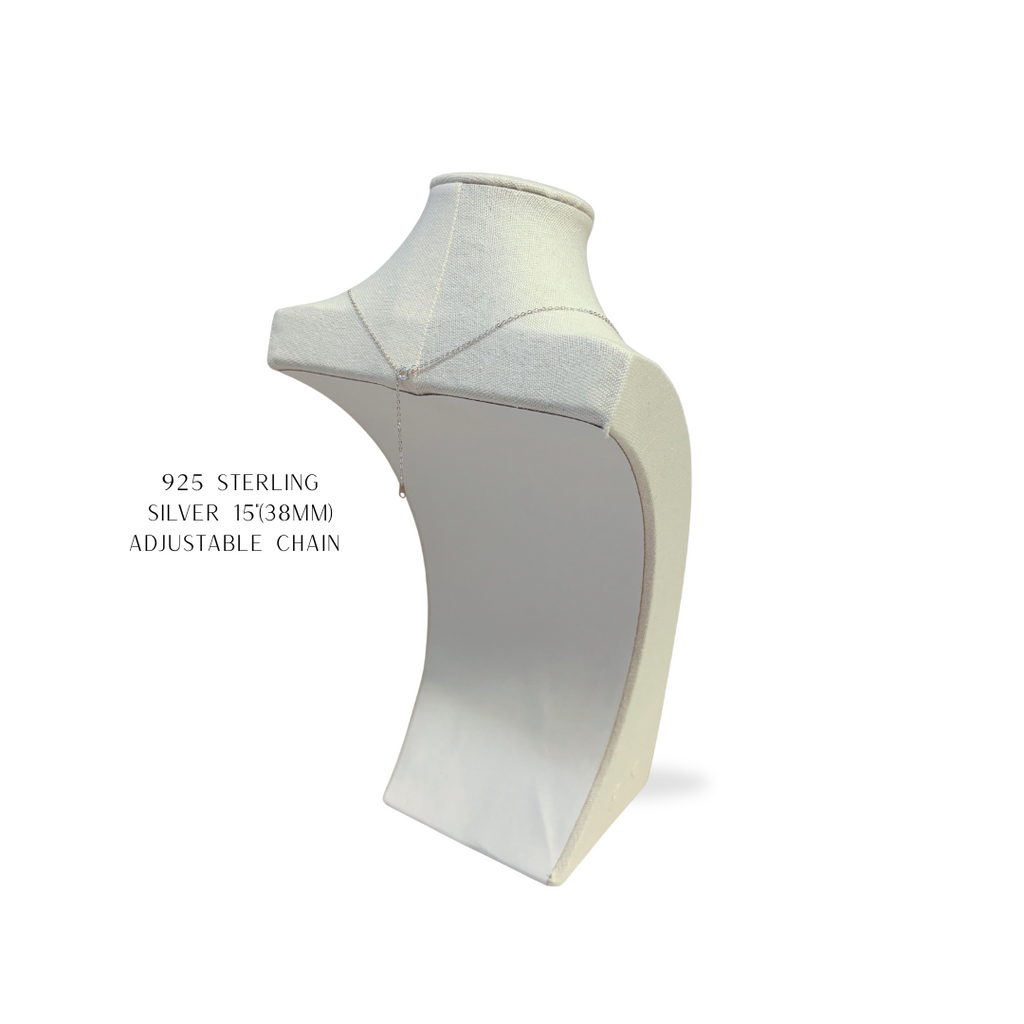 Mannequin wearing a silver necklace on a white background