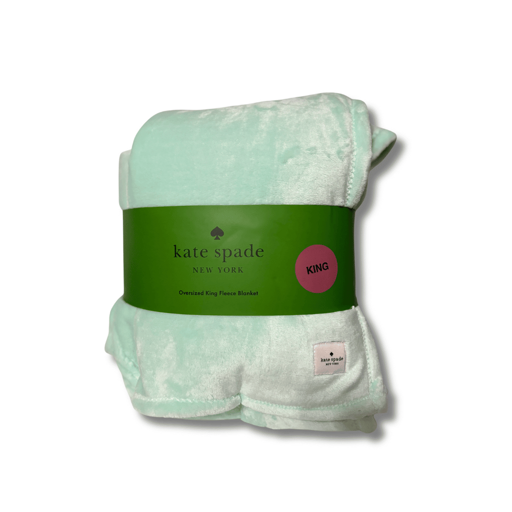 Indulge in warmth and luxury with the stylish Kate Spade Oversized King fleece blanket in a beautiful Seafoam. This color is beautiful, a soft green blue color thats not too bright and certainly not dull. 