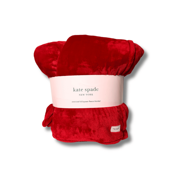 Add warmth and style to your space with the Kate Spade New York Oversized Full/Queen Fleece Blanket in a stunning red hue. This ultra-soft and cozy blanket is generously sized at 98" x 92", making it perfect for snuggling and sharing