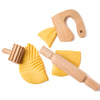 Wooden play dough tools with yellow play dough on a white background