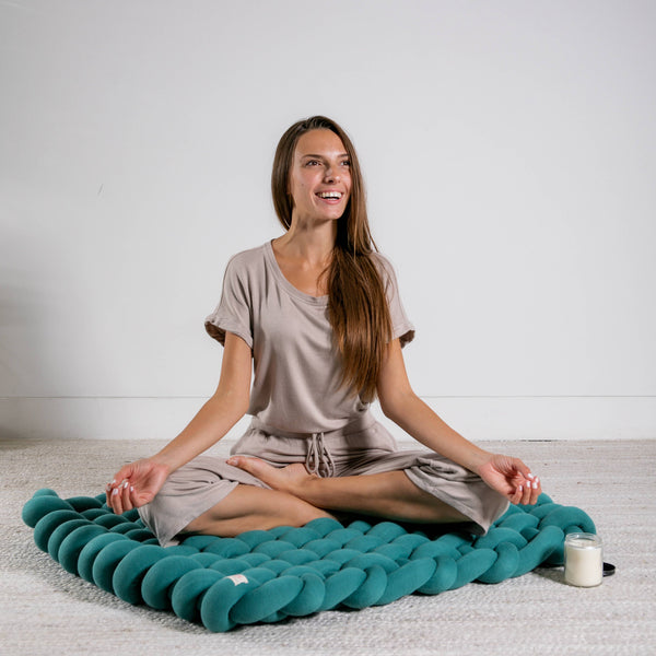 One of our most unique knit designs, these oversize loopy knit floor cushions create a comfortable floor space - read, baby mat, relax.  30 x 30 x 3 inches.  GOTS certified and Hypoallergenic.