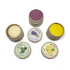 Set of 3 small containers with lids, each labeled with a different color and flavor of therapy dough.