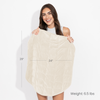 Woman holding a beige blanket with measurements and weight information on a white background