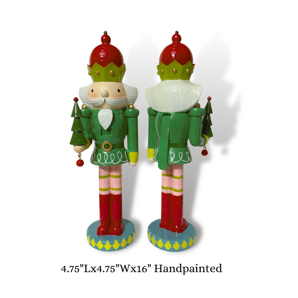 Bring some festive cheer with this adorable 16.5" Resin Nutcracker King holding Tree! Crafted in quirky greens, red, and pink, it's the perfect playful addition to your holiday home decor. Add it to your tabletop or mantle for a touch of whimsy. Perfect for decorative use and easily cleaned with a damp cloth. Measures 16.5" Tall (4.75" L&amp;W), you won't be able to resist this cute little guy!