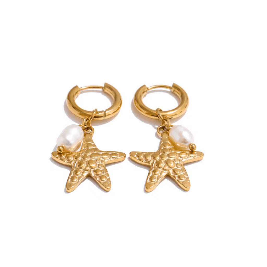 Gold hoop earrings with starfish and pearl charms on a white background
