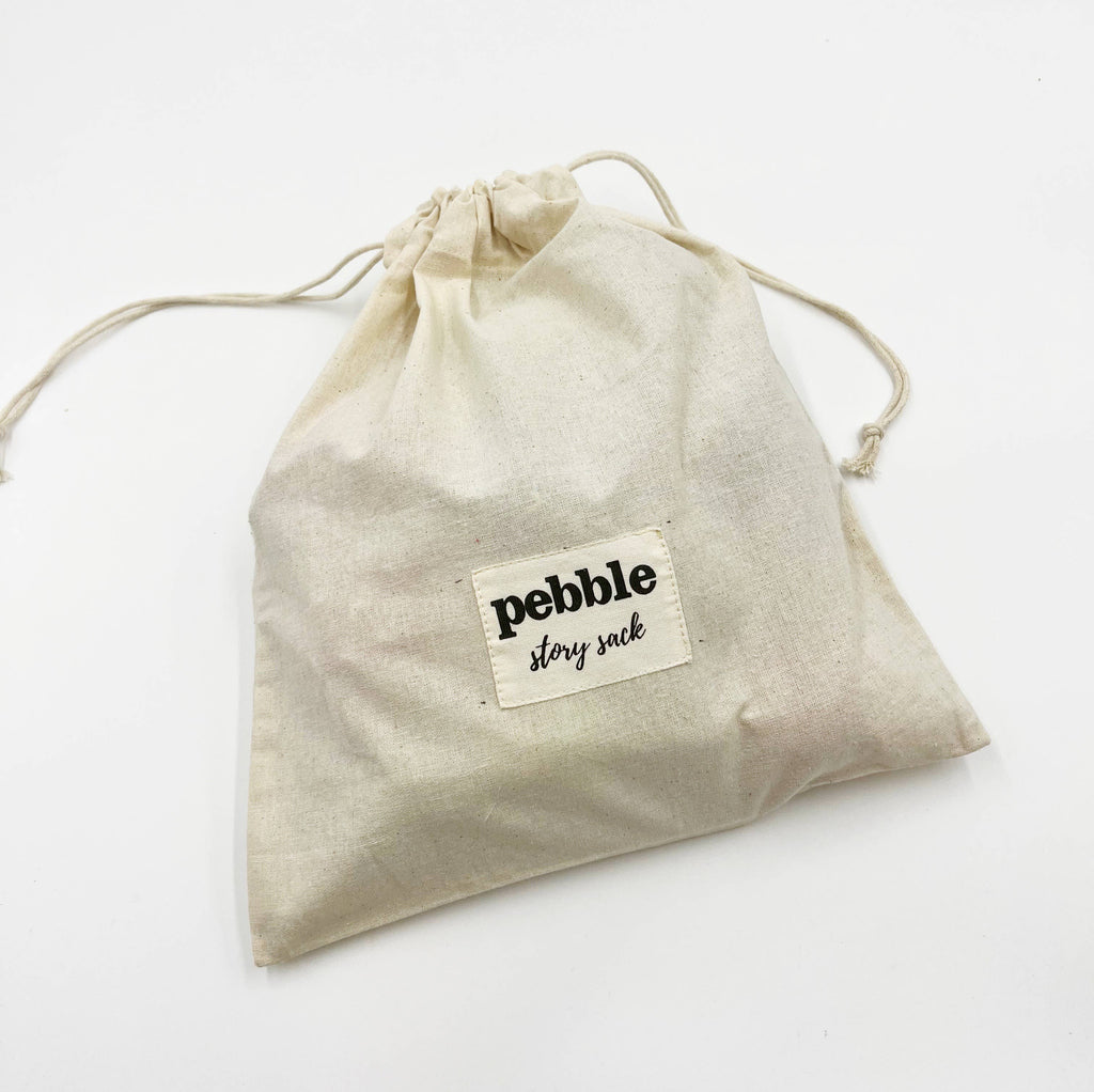 Beige drawstring bag with 'pebble story sack' label on a white background