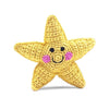 Crocheted yellow star with a smiley face that goes with the the perfect good night moon gift set.