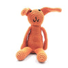 Crocheted orange cat toy on a white background