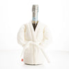 Bottle of champagne in a white robe for a great gift for wine lovers.