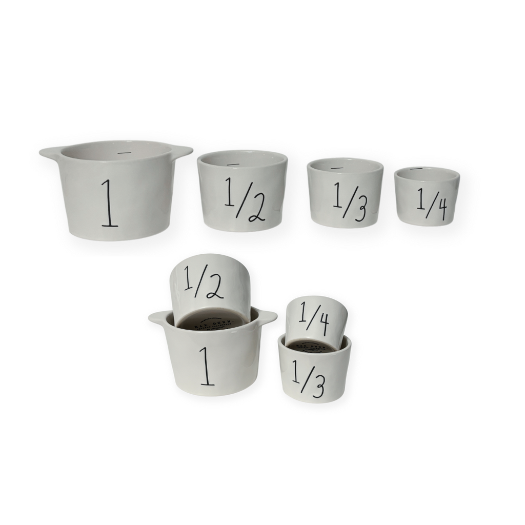 Rae Dunn Classic Bucket Measuring Cups - a must-have for your kitchen! These adorable cups have a playfully whimsical bucket design, and of course, Rae Dunn's signature artisan numbers.&nbsp;