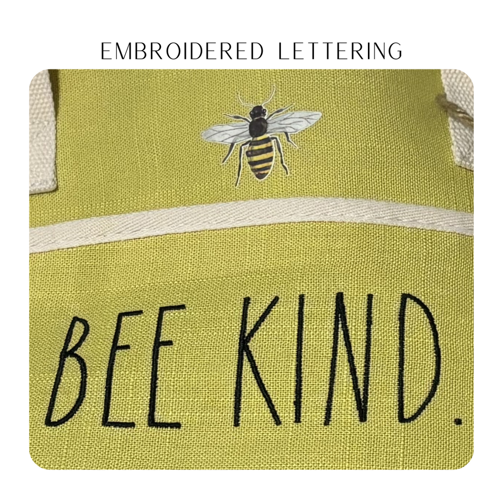 Take your Rae Dunn Cooler Tote - with its linen exterior, zip closure, and insulated lining - for any vacation, beach day, barbecue, picnic or gathering! Conveniently store your food and drinks with its 10L capacity and front pocket, plus, it's adorned with embroidered words 'Bee Kind' - perfect gift idea!