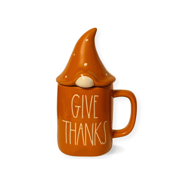 Rae Dunn Give thanks Gnome Mug complete with a polka dotted gnome top. &nbsp;Add a touch of whimsy to your coffee or use it as a unique decor piece. &nbsp;Also a fabulous gift/hostess gift idea for gatherings and thanksgiving