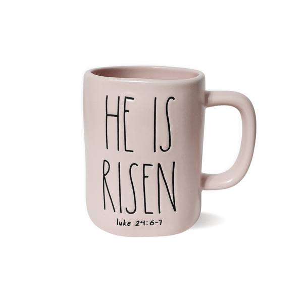 Feel the joy and inspiration every day with this stunning Rae Dunn Coffee Mug adorned with classic artisan lettering and the powerful message of "He is Risen" and Luke 24:6-7.&nbsp;