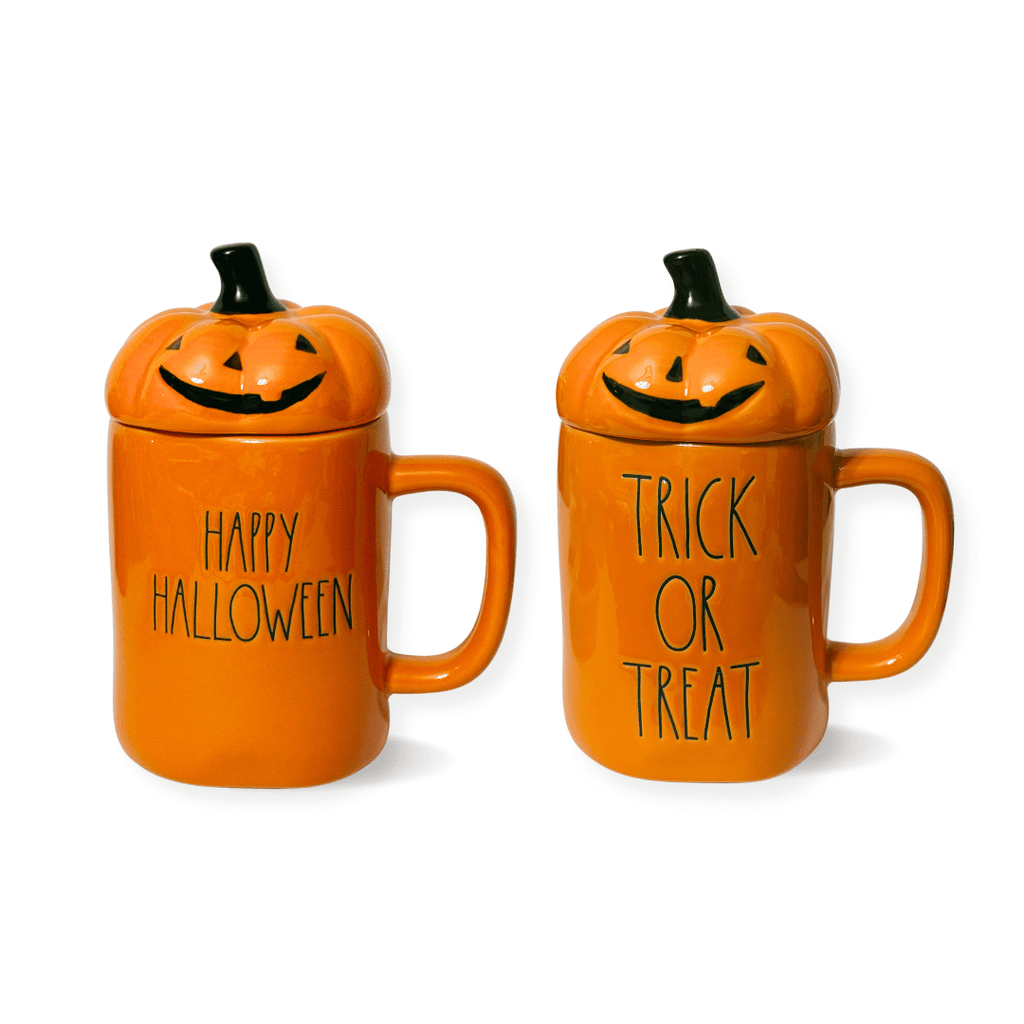 Boost your Halloween pumpkin game with a bold orange mug featuring a jack-o-lantern topper. Rae Dunn's Happy Halloween or Trick-or-Treat mugs stand tall at 6.75". Perfect for spicing up your morning coffee or adding a touch of fun to your decor.
