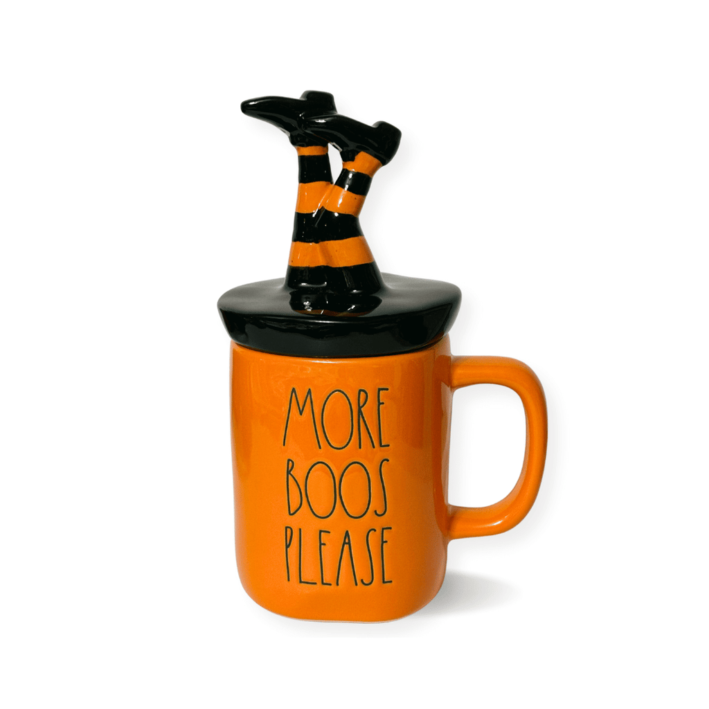 Get ready to spook up some laughs this Halloween with Rae Dunn's witchy More Boos Please mug. Featuring upside down witch legs and iconic artisan lettering, this orange mug is perfect for adding a touch of humor to your decor. It also makes a great gift for any ghouly girl who loves witches, or as a playful hostess gift. More boos, please!  Cute Halloween Gifts