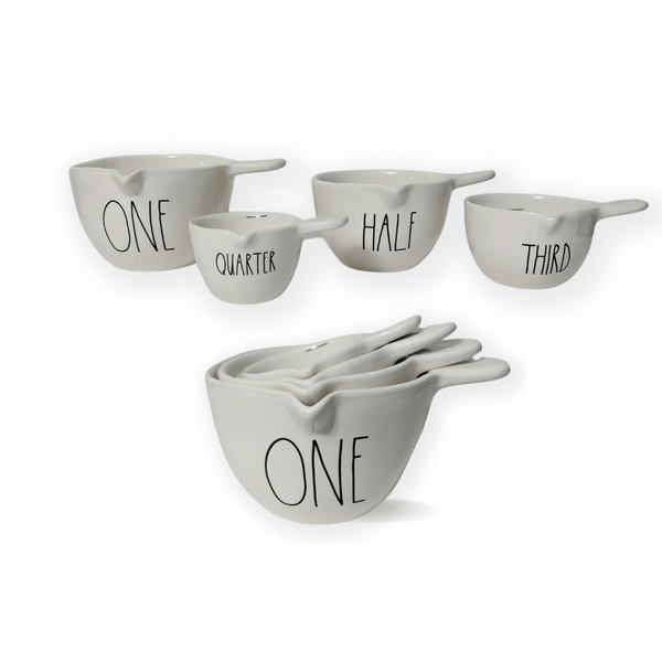 Check out the never-ending styles! Introducing the new Rae Dunn White Handle Measuring Cups! Complete with one cup, half cup, quarter cup, and third cup, all adorned with the iconic Rae Dunn x Magenta Artisan writing.