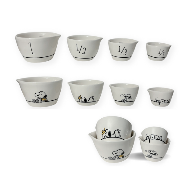 Rae Dunn Snoopy Measuring Cups Enjoy measuring ingredients in Snoopy style with these fun Rae Dunn x Peanuts Measuring Cups! Featuring 1 cup, 1/2 cup, 1/3 cup, and 1/4 cup in classic Rae Dunn x Magenta Artisan writing and artwork of Snoopy and Woodstock. &nbsp;