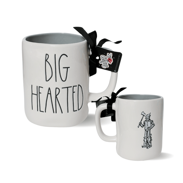 Rae Dunn’s Wizard of Oz™ Collaboration mugs. Each mug is made of quality stoneware and features a whimsical portrait of your favorite Wizard of Oz™ Characters.
The front features Rae Dunn’s classic Artisan hand lettering, while the back showcases beautiful artwork