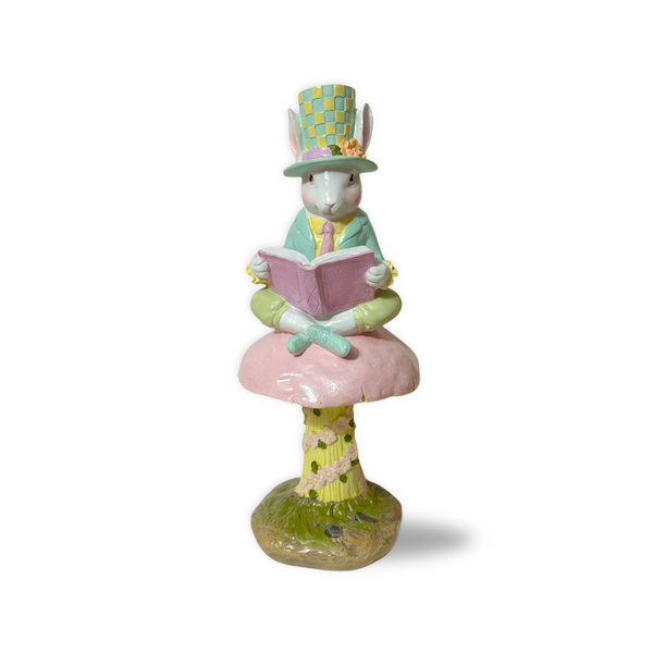 Experience the whimsy and charm of this Vintage Inspired 15" Mad Hatter Sitting on Mushroom. Raz imports style mad hatter, Resin Mad Hatter on mushroom. 