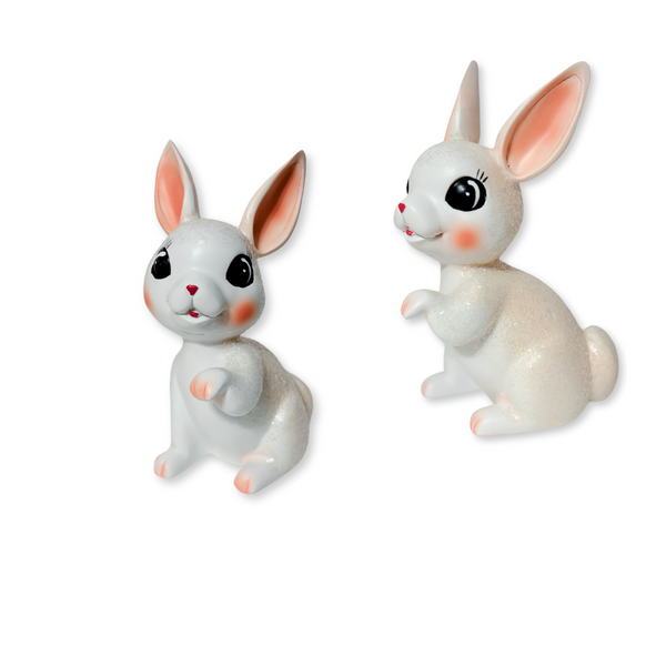 These charming 8" bunnies in teal and light pink will transport you back in time with their hand-painted, glittery retro vintage style. You can't help but adore them.