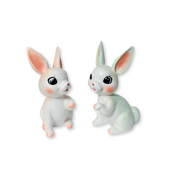 These charming 8" bunnies in teal and light pink will transport you back in time with their hand-painted, glittery retro vintage style. You can't help but adore them.