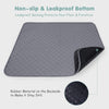 Gray pet mat with non-slip and leakproof features on a white background