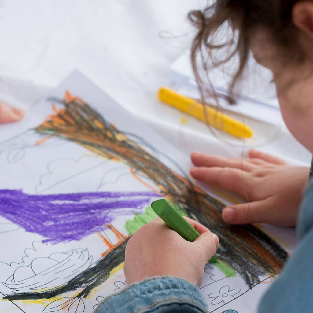 Child using non-toxic crayons to color.  Great toddler gift.