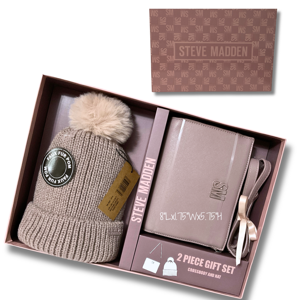 Introducing the perfect gift set from Steve Madden - featuring an adorable Faux Fur Pom Pom hat adorned with a metal logo and a stylish Lilac Mauve crossbody. The crossbody boasts a convenient middle zip pocket and fold down sides with three card holders, making it both practical and fashionable. Elevate your accessory game with this must-have set! &nbsp;Comes with Steve Madden gift box with lid (so cute!).</p> <p>Crossbody MSRP: $88.00 Limited time bonus offer - free bunny with back zip pocket.