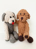 Two crocheted dog toys, one gray and one brown, on a white background.