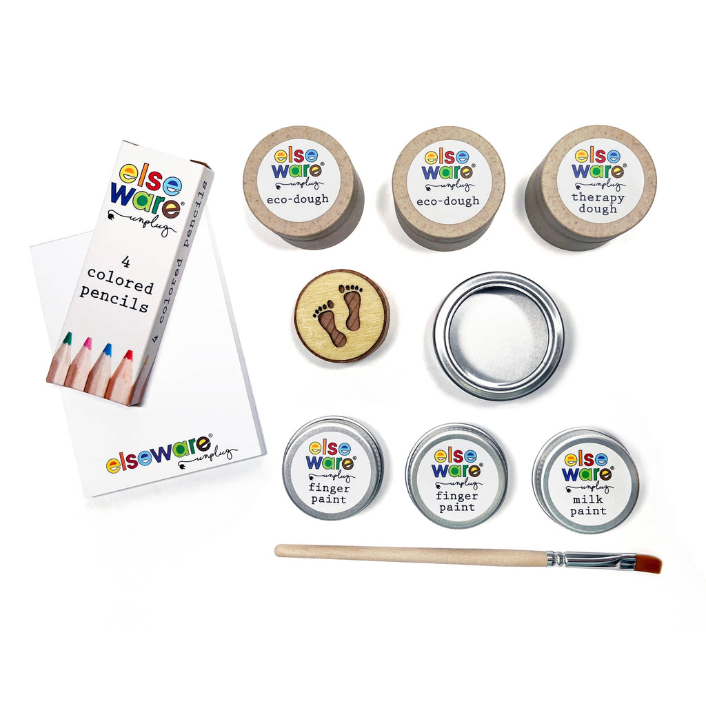 Set of eco-dough, colored pencils, and paint products from elsewhere unplug. Cute travel set for kids.