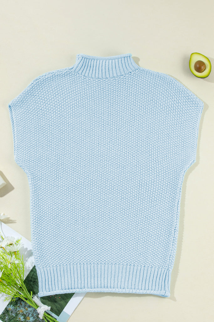 This knitted sweater provides a textured finish
Unique batwing sleeves for a stylish silhouette
Solid color for a versatile wardrobe staple
High neck design for a sophisticated touch