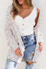 Unleash your style effortlessly with this ribbed cardigan, sprinkled with confetti dots for a playful touch. Its open front design adds a trendy twist, perfect for layering over a tank and jeans to create a chic look. &nbsp;We LOVE LOVE LOVE!