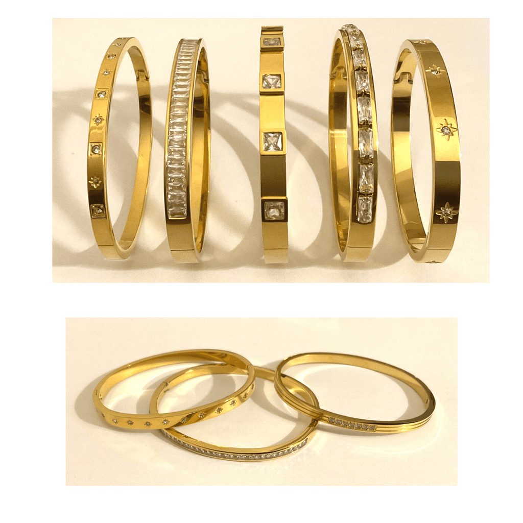 18K gold plated stainless steel bangles with differing cubic zirconia inlays.Our hope when worn, is these bands our a reminder of how strong, fierce, and unstoppable you are. Whether you wear one or multiples, it's a reminder to always let that light within you shine. &nbsp;If your days are dark, may wearing it help guide you to brighter ones.>A perfect gift to say YOU ROCK! A perfect gift to say YOU ROCK! Tarnish free WaterproofHypoallergenic. Width 2.2 Hinged bangle with clasp opening