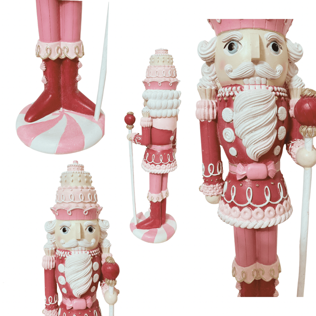 December Diamonds exquisitely crafted nutcracker stands at 21.5" tall, an elegant addition to your festive or sweets décor. Also available in teal.  Total Size: 6"L 21.5"H x 5.5"W | Resin