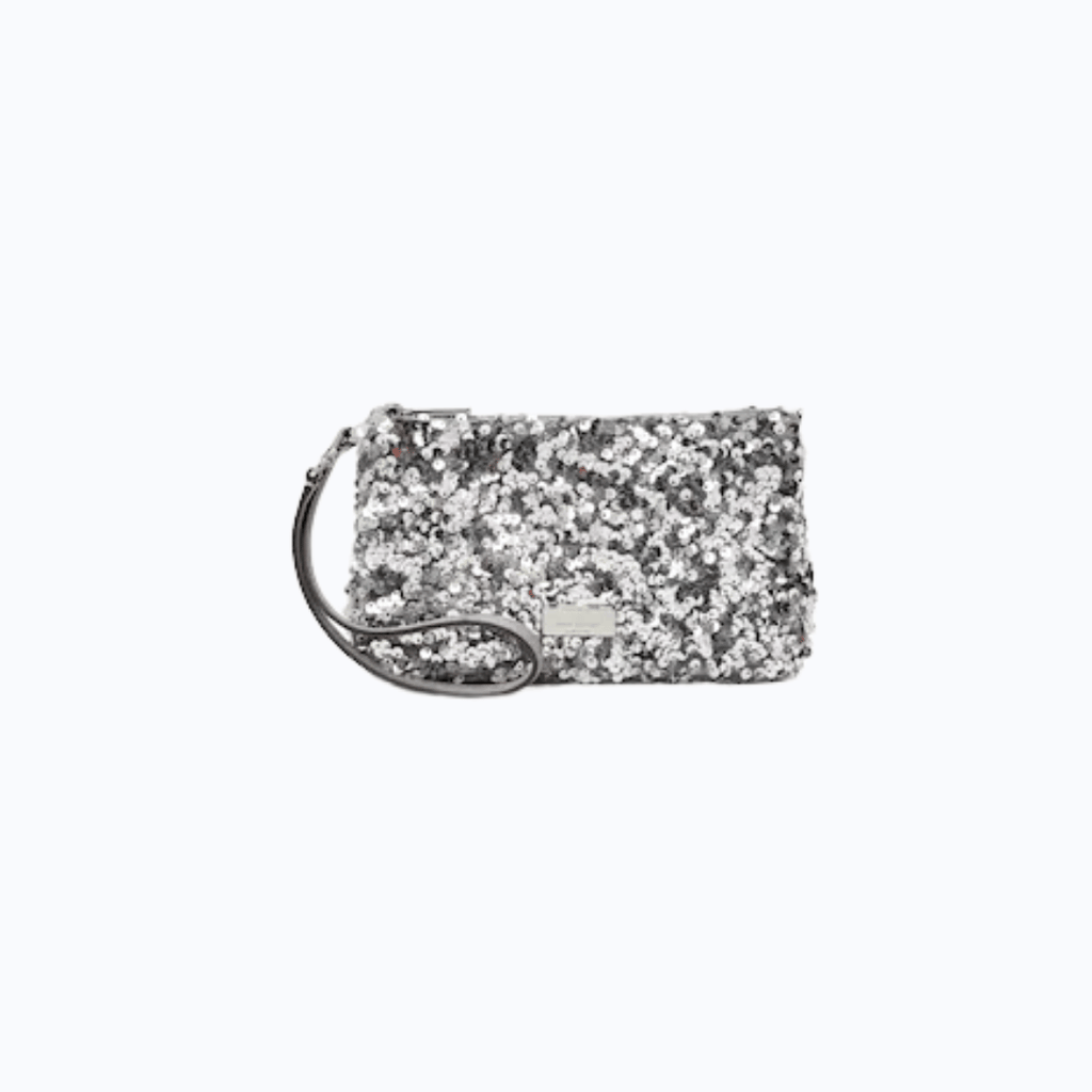 Dress it up or dress it down.  This sequin Kate Spade convertible wristlet is Fabulous!  Great Holiday Clutch/Wristlet or Anytime bag really!   This is an adorable accessory and perfect for your small must haves! Measurements 5" W x 8" H x 12.5" D | Strap Drop: 5 1/8" | plaque logo | interior: 6 credit card slots slip pocket | Materials: sequin fabric